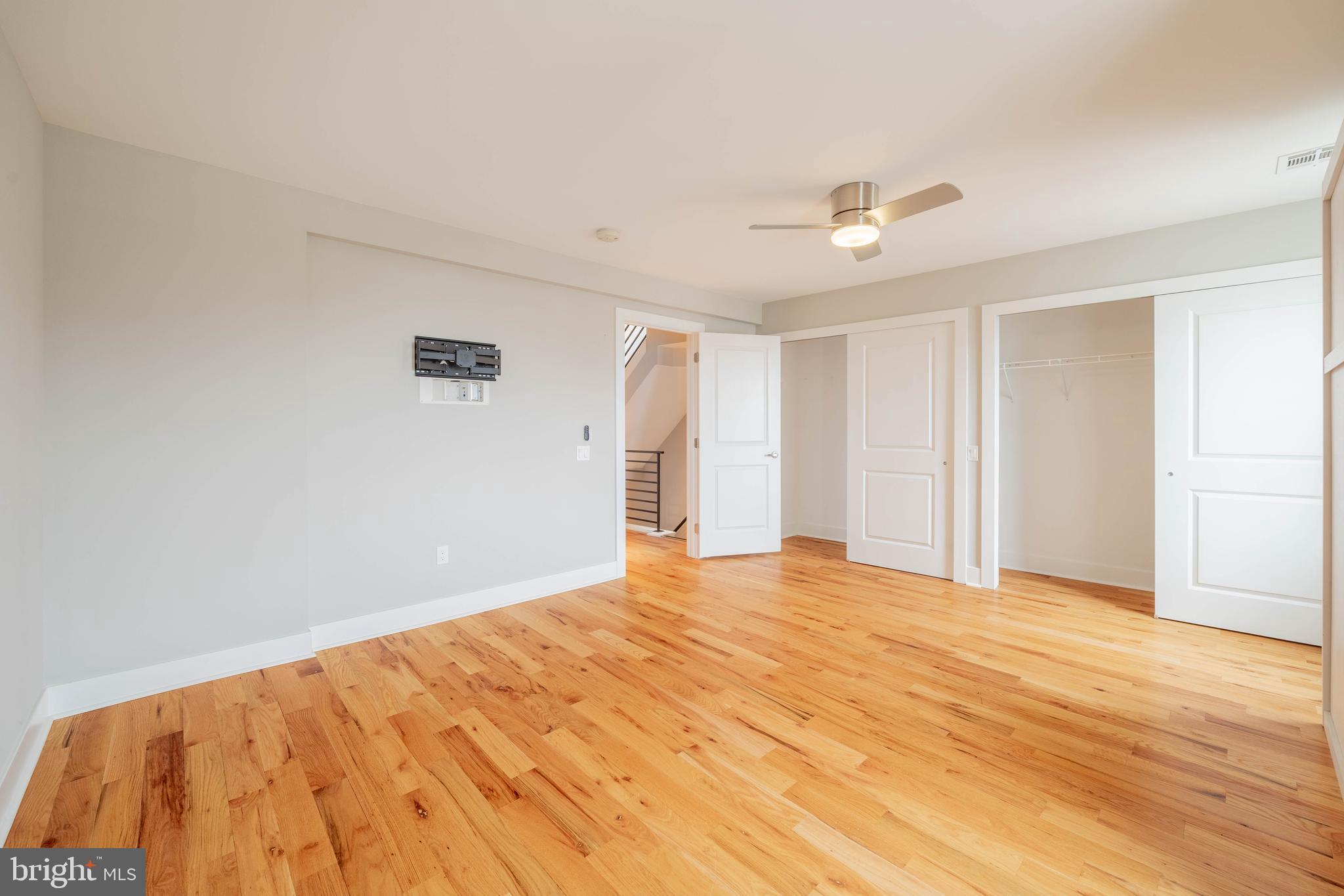 317 North Front Street Philadelphia, PA 19106 - Photo 15 of 27 a view of empty room with wooden floor and fan