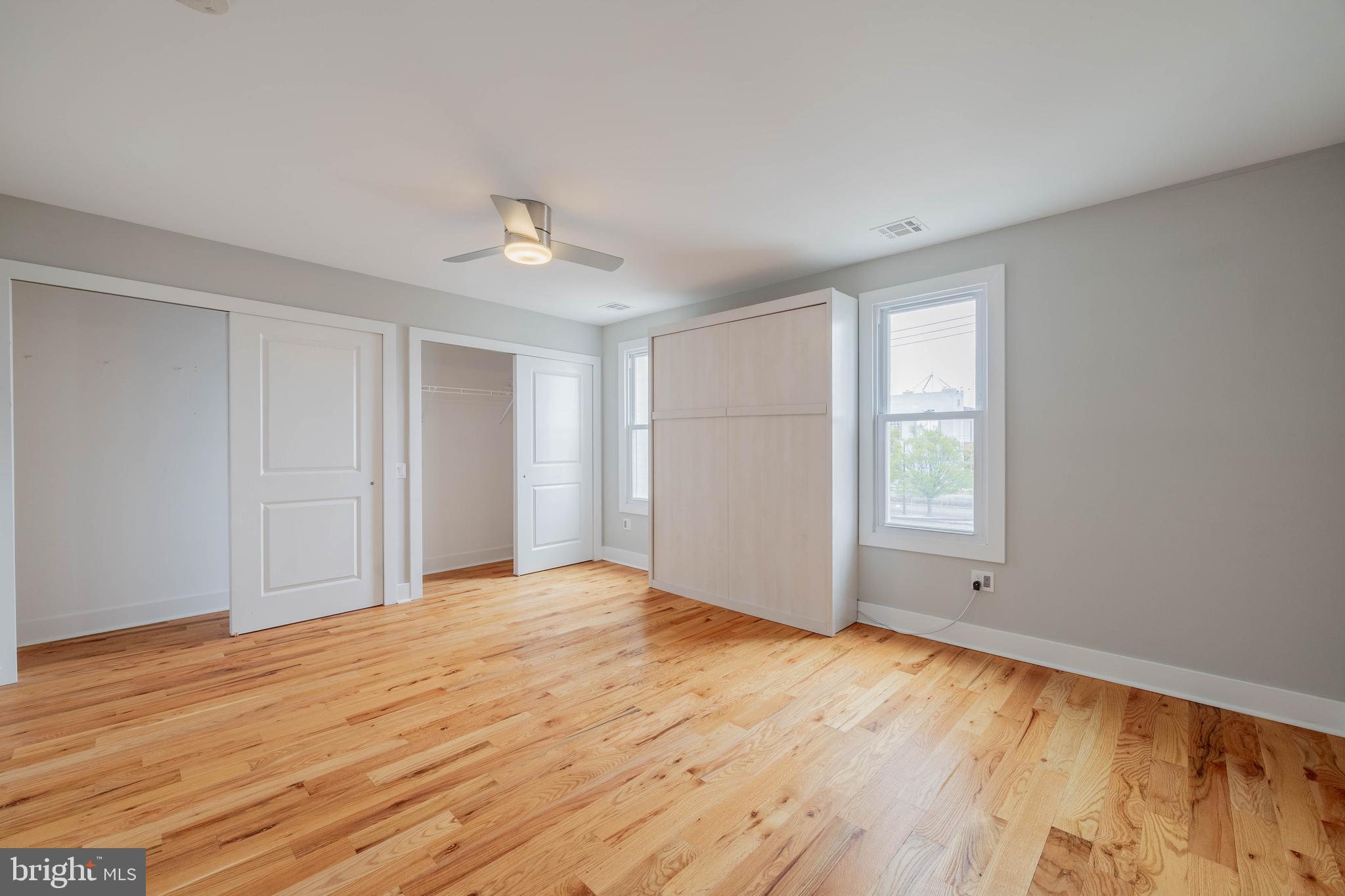 317 North Front Street Philadelphia, PA 19106 - Photo 16 of 27 a view of an empty room with wooden floor and a window