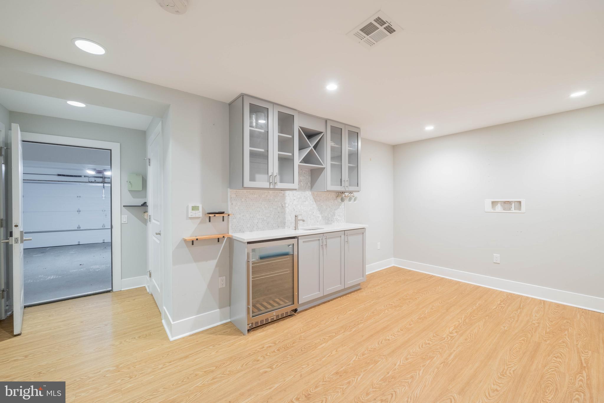 317 North Front Street Philadelphia, PA 19106 - Photo 19 of 27 a view of a kitchen with a sink and dishwasher a refrigerator with white cabinets