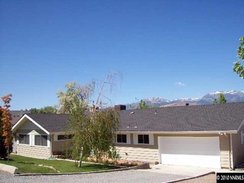 14675 Rim Rock Drive Reno, NV 89521 - Photo 1 of 1 a front view of a house with a yard