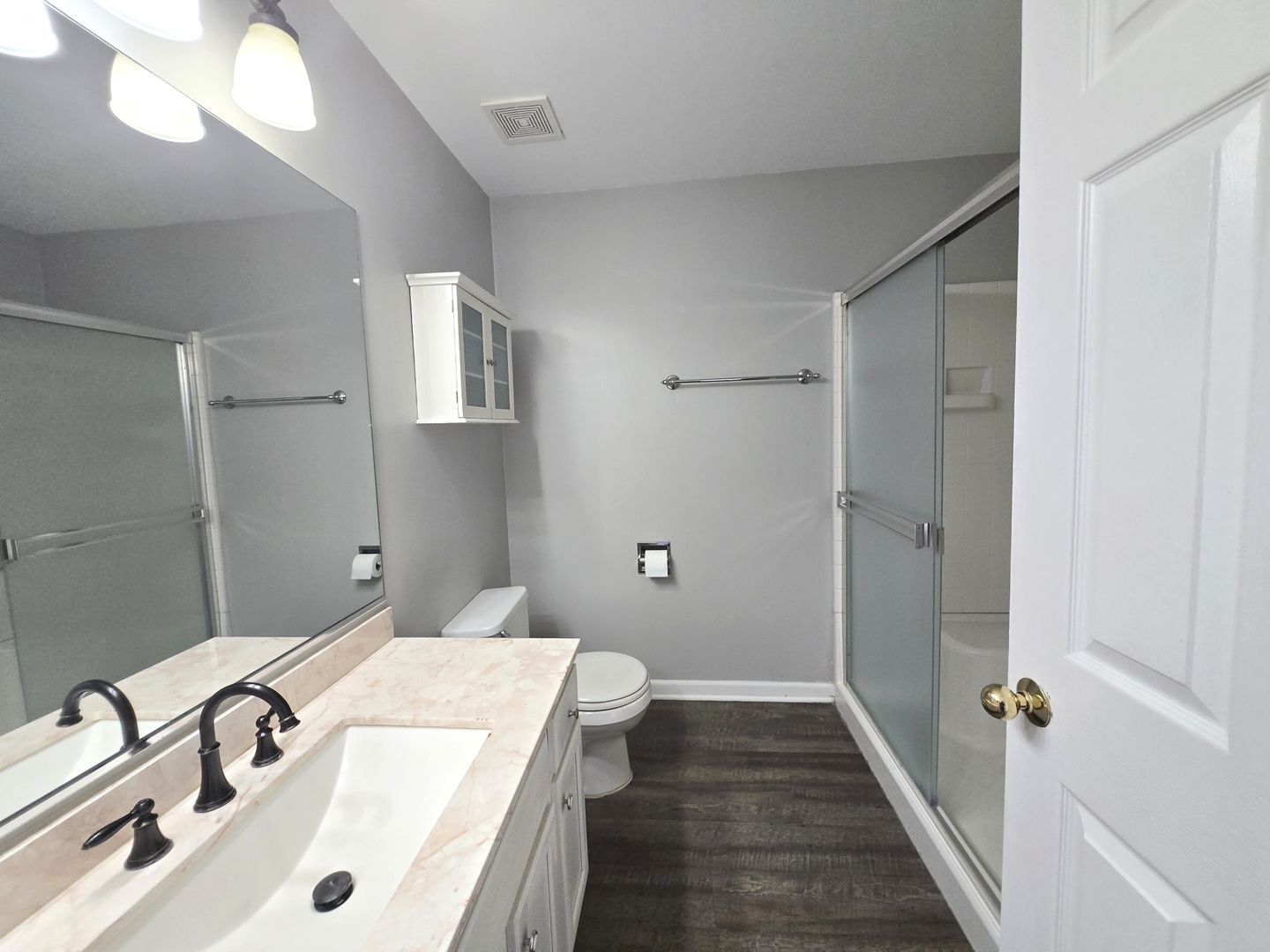 3003 Anton Drive Aurora, IL 60504 - Photo 8 of 10 a bathroom with a sink and shower