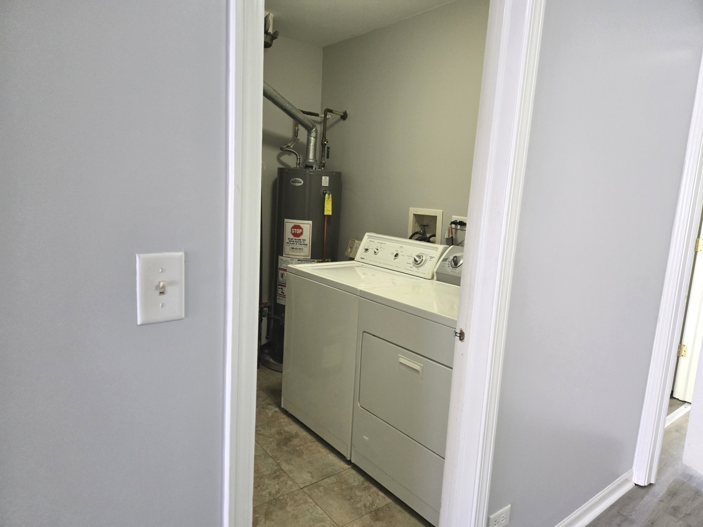 3003 Anton Drive Aurora, IL 60504 - Photo 9 of 10 a utility room with dryer and washer