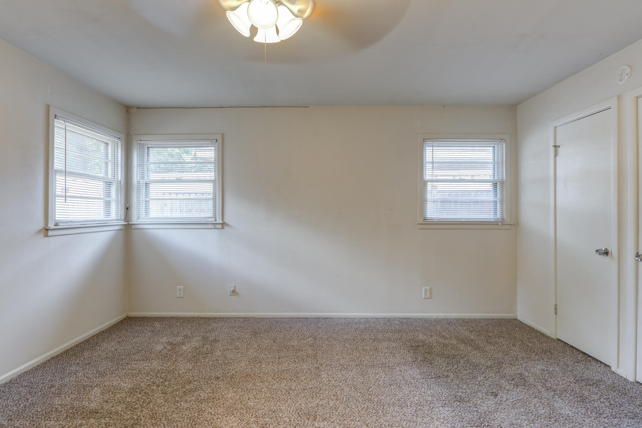 3614 45th Street Lubbock, TX 79413 - Photo 15 of 38 an empty room with windows