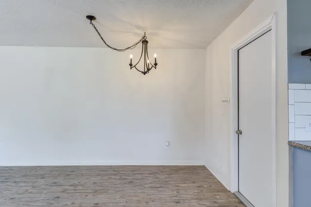 a view of a room with rack on the wall