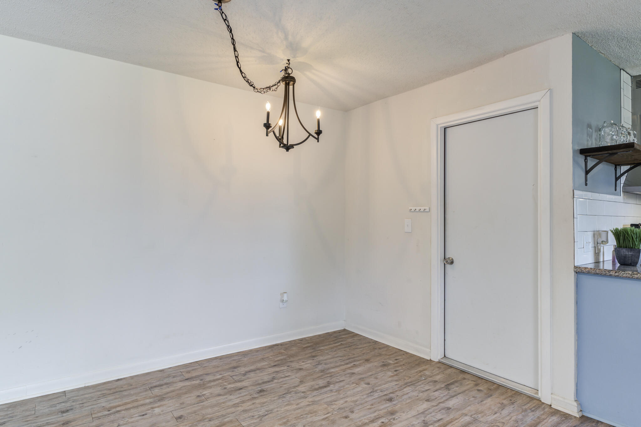 3614 45th Street Lubbock, TX 79413 - Photo 27 of 38 a view of a room with rack on the wall