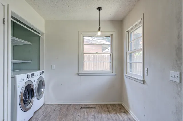 a utility room with dryer and washer