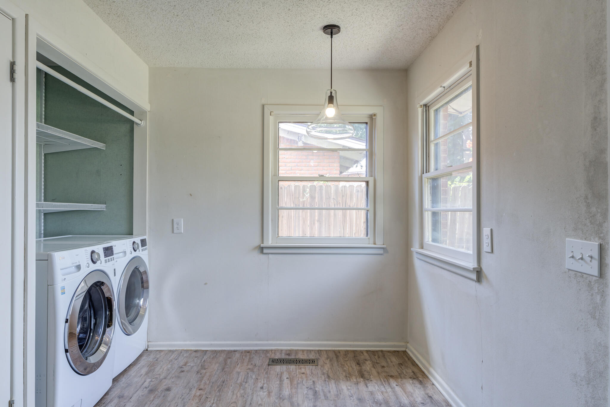 3614 45th Street Lubbock, TX 79413 - Photo 33 of 38 a view of livingroom with washer and dryer