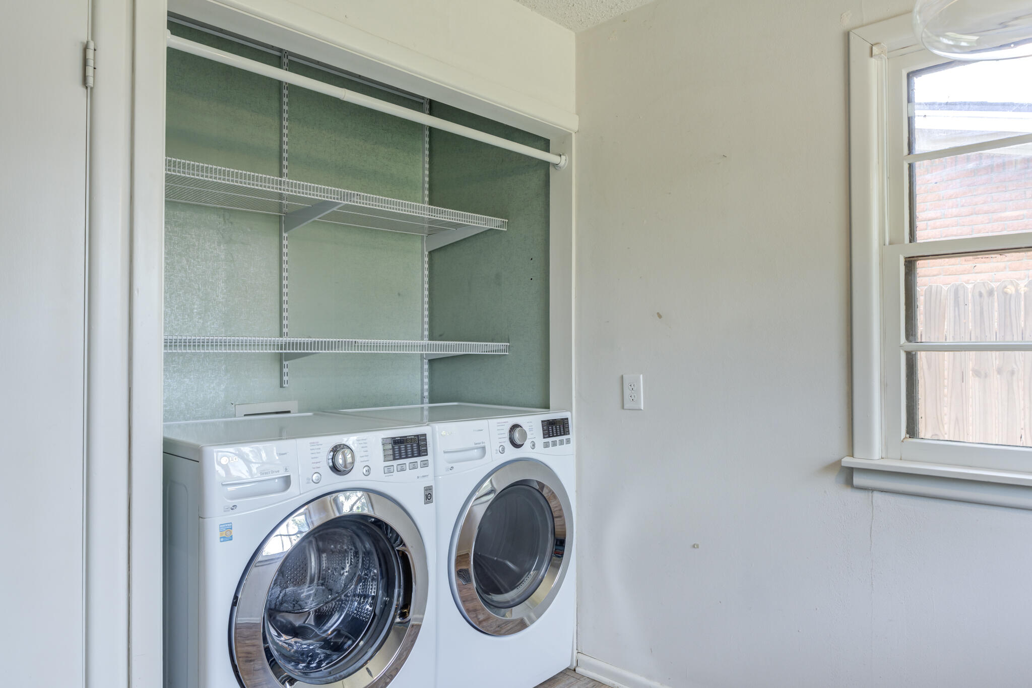 3614 45th Street Lubbock, TX 79413 - Photo 34 of 38 a utility room with dryer and washer