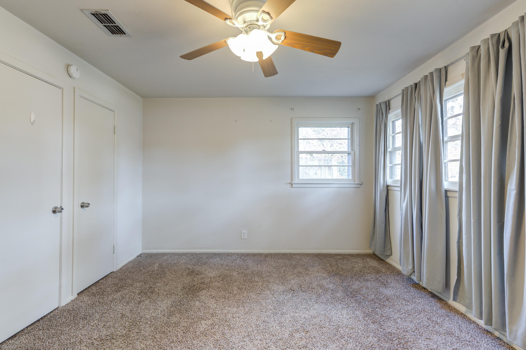 3614 45th Street Lubbock, TX 79413 - Photo 10 of 38 a view of an empty room with a window