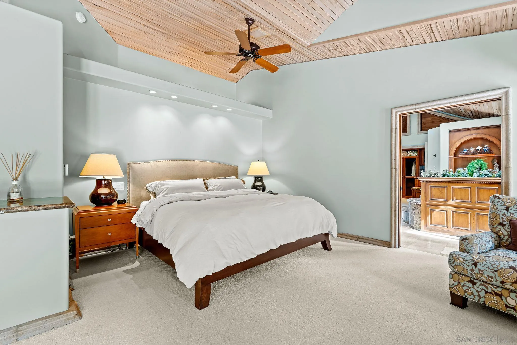 2969 Racetrack View Drive Del Mar, CA 92014 - Photo 22 of 59 a bed room with a bed and a chandelier