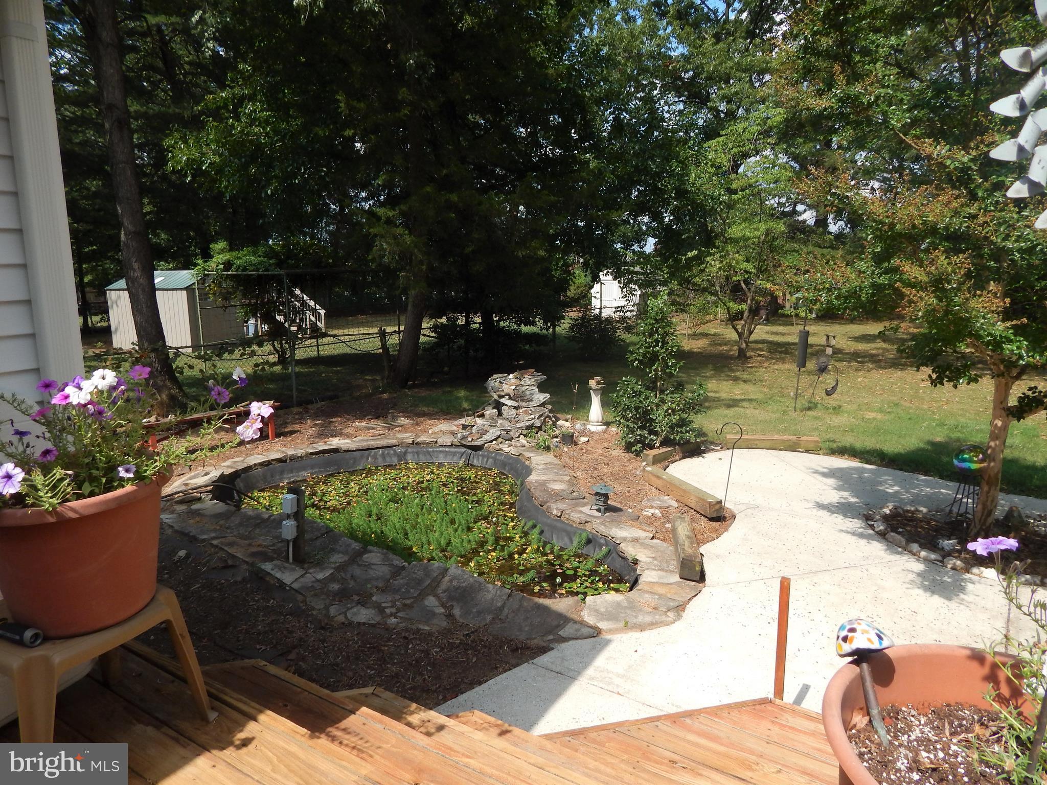 7314 Castlemoor Road Baltimore, MD 21244 - Photo 3 of 39 Fish Pond with Waterfalls