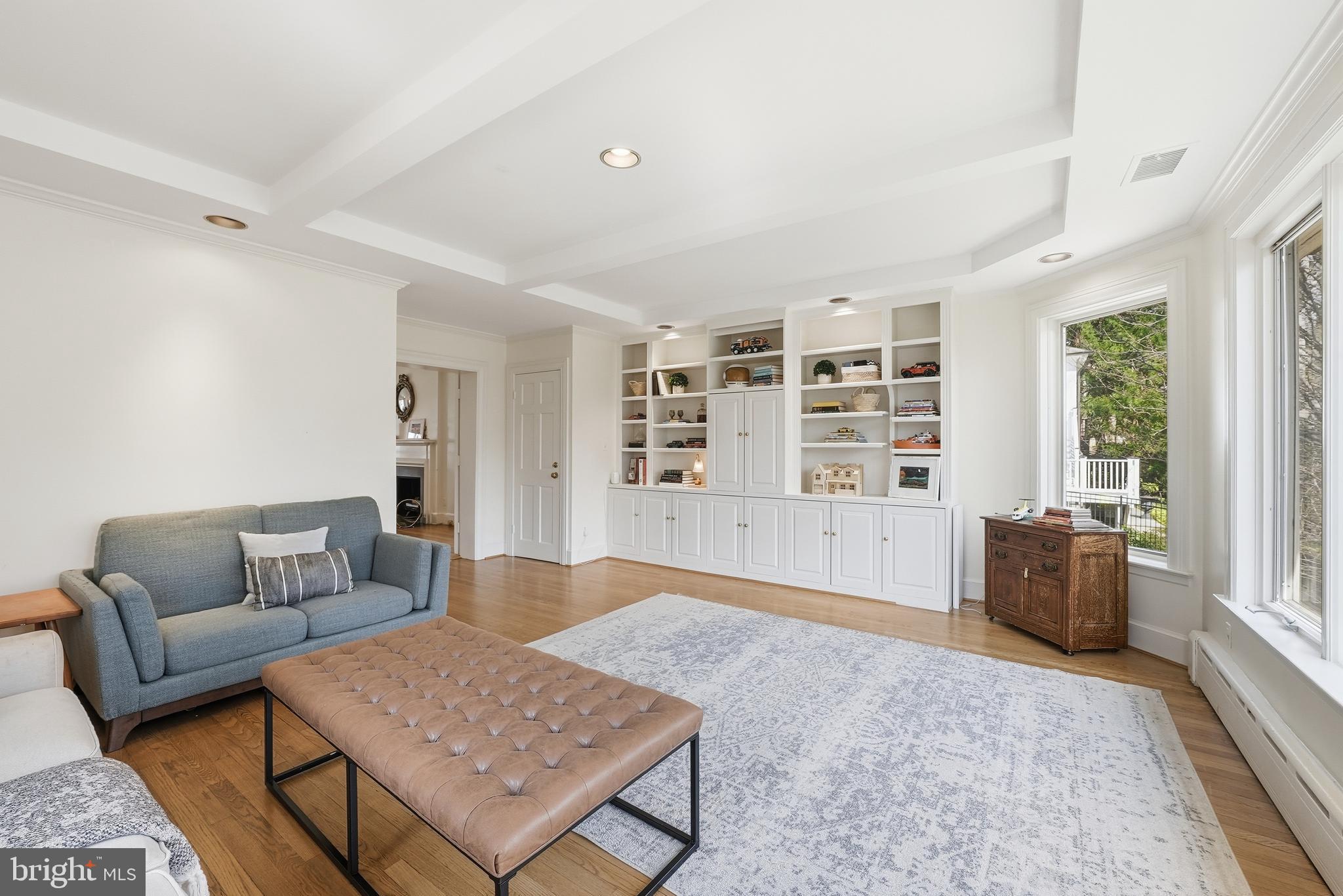 4938 Quebec Street Northwest Washington, DC 20016 - Photo 11 of 51 a living room with furniture and a rug