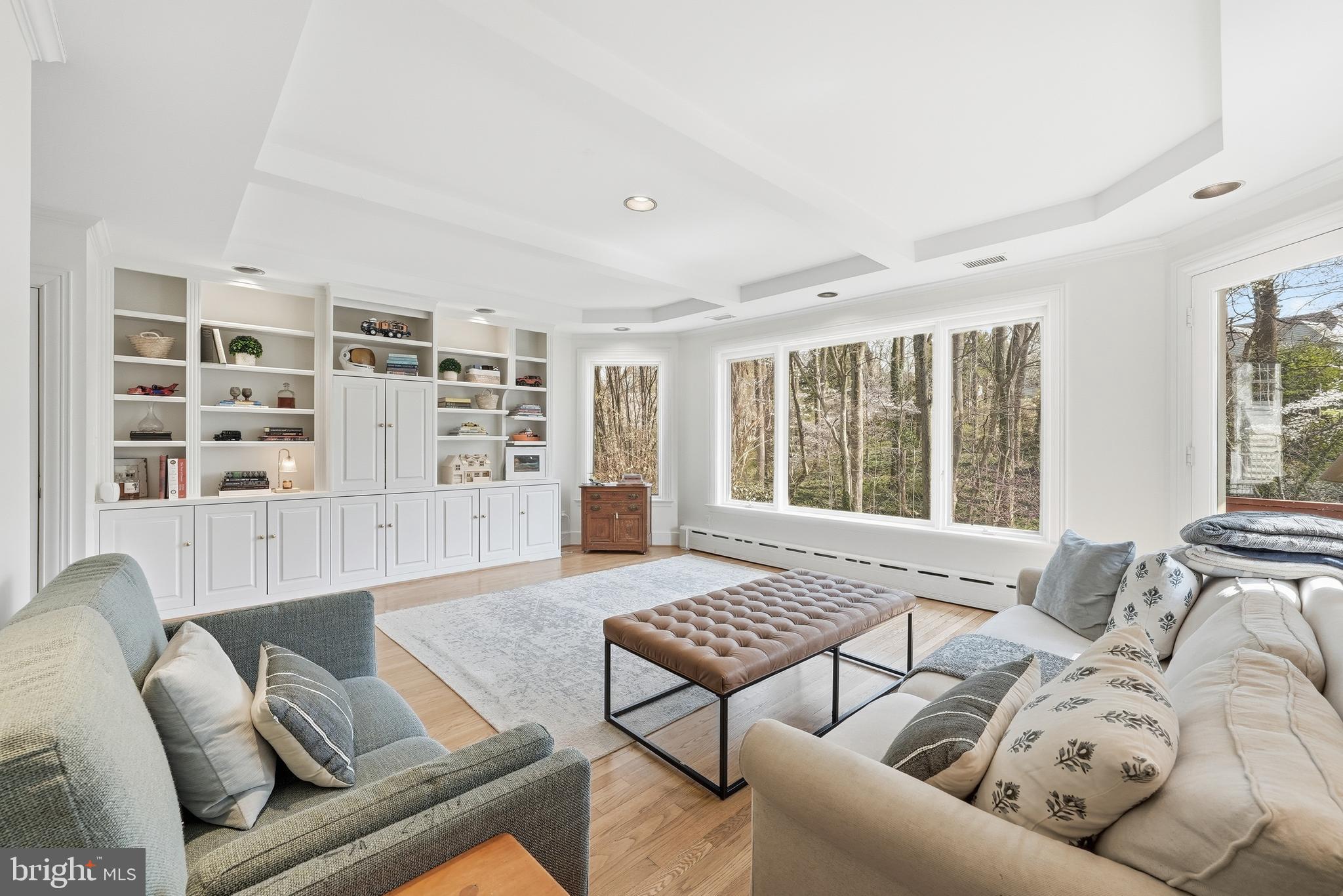 4938 Quebec Street Northwest Washington, DC 20016 - Photo 12 of 51 a living room with furniture and a window