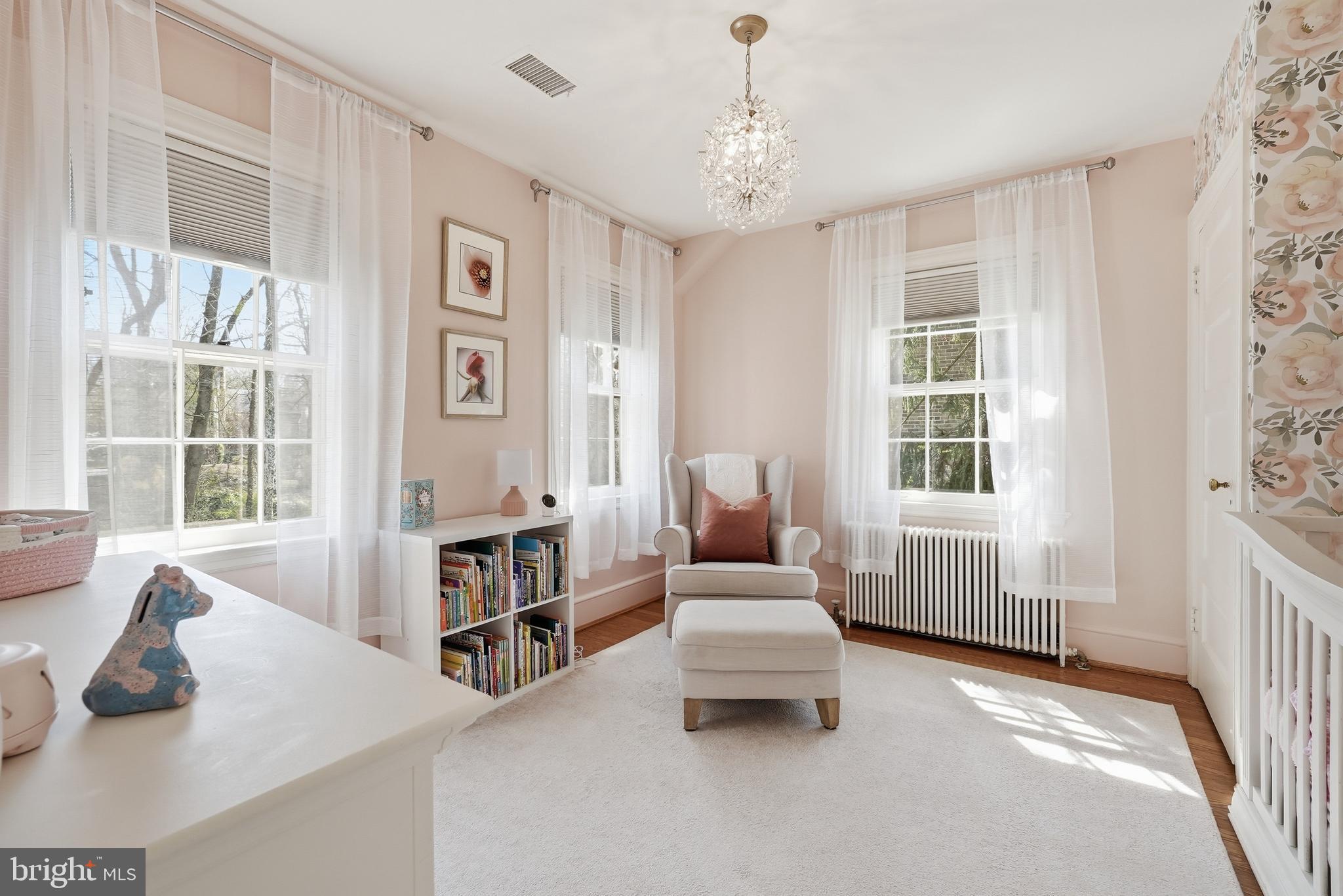 4938 Quebec Street Northwest Washington, DC 20016 - Photo 29 of 51 a living room with furniture and a window