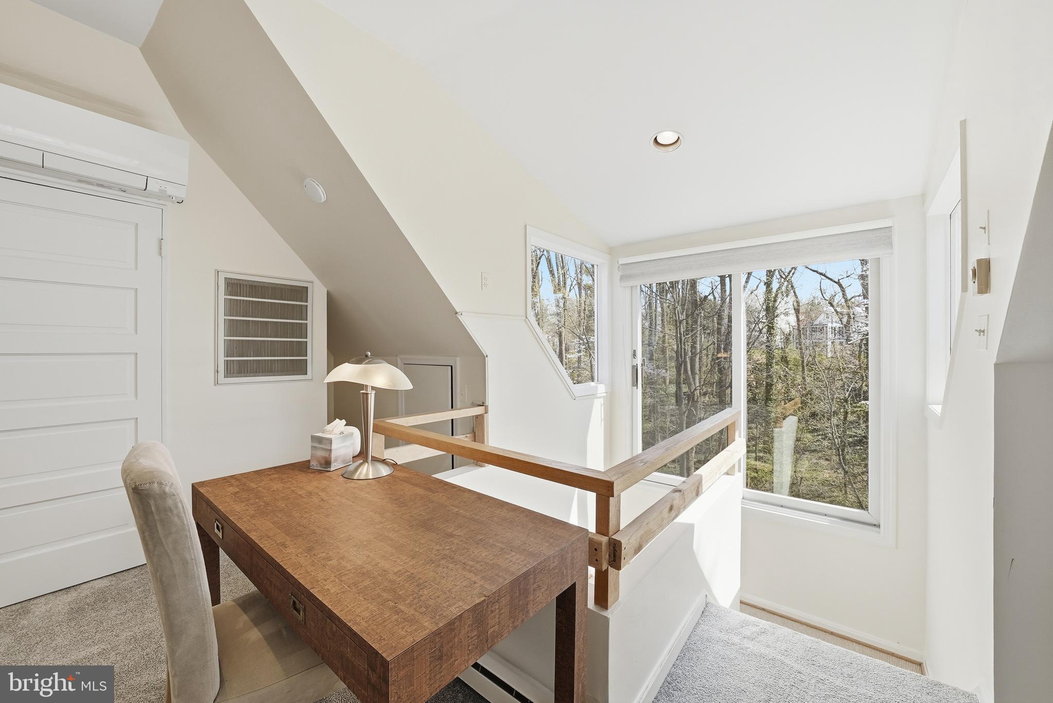 4938 Quebec Street Northwest Washington, DC 20016 - Photo 39 of 51 a dining room with furniture and a window
