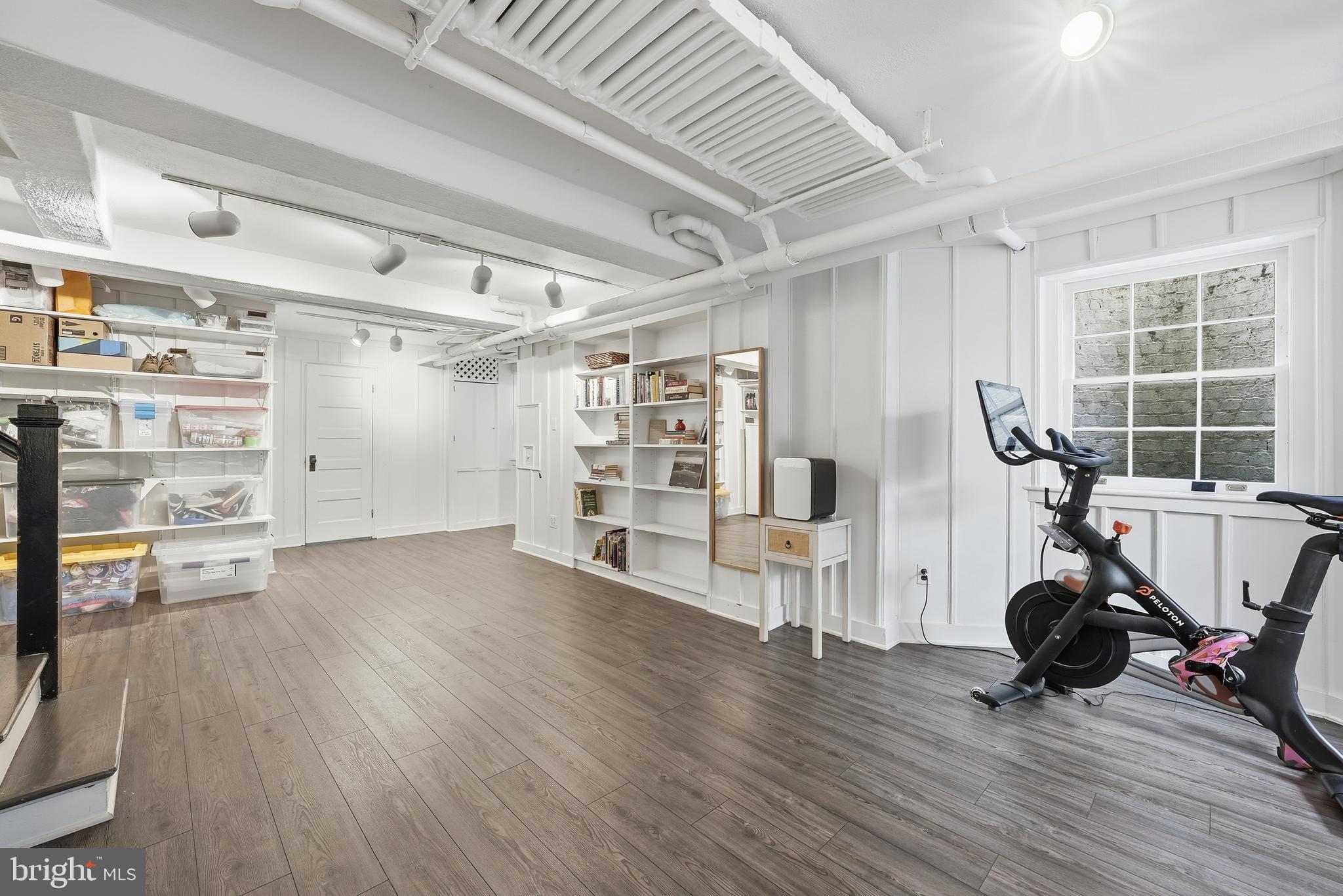 4938 Quebec Street Northwest Washington, DC 20016 - Photo 41 of 51 a view of a room with gym equipment