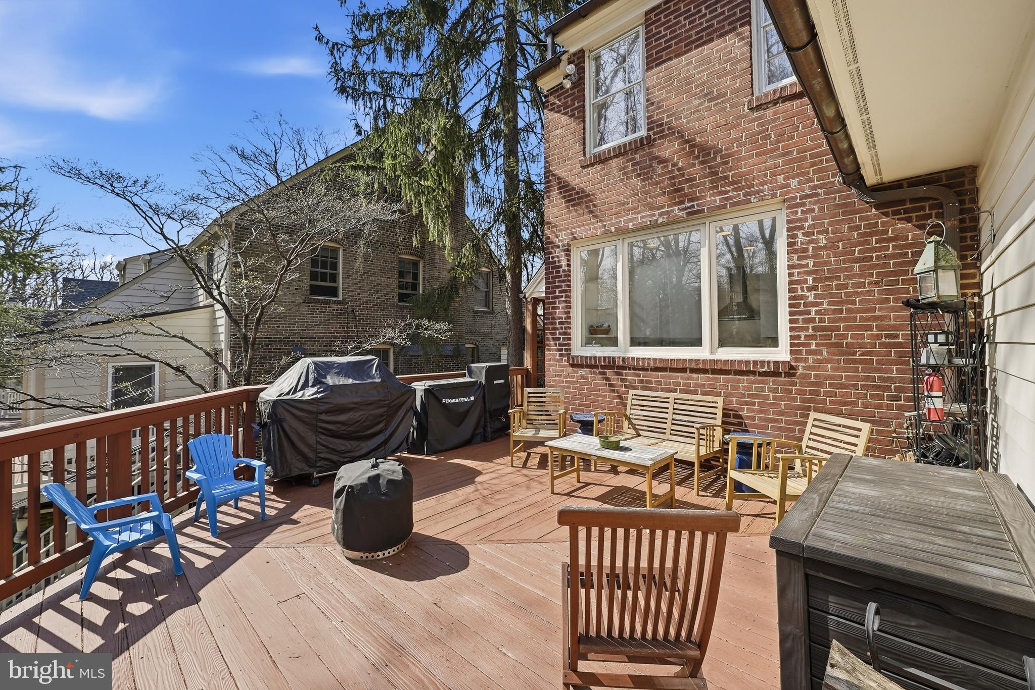 4938 Quebec Street Northwest Washington, DC 20016 - Photo 47 of 51 a view of a deck with furniture