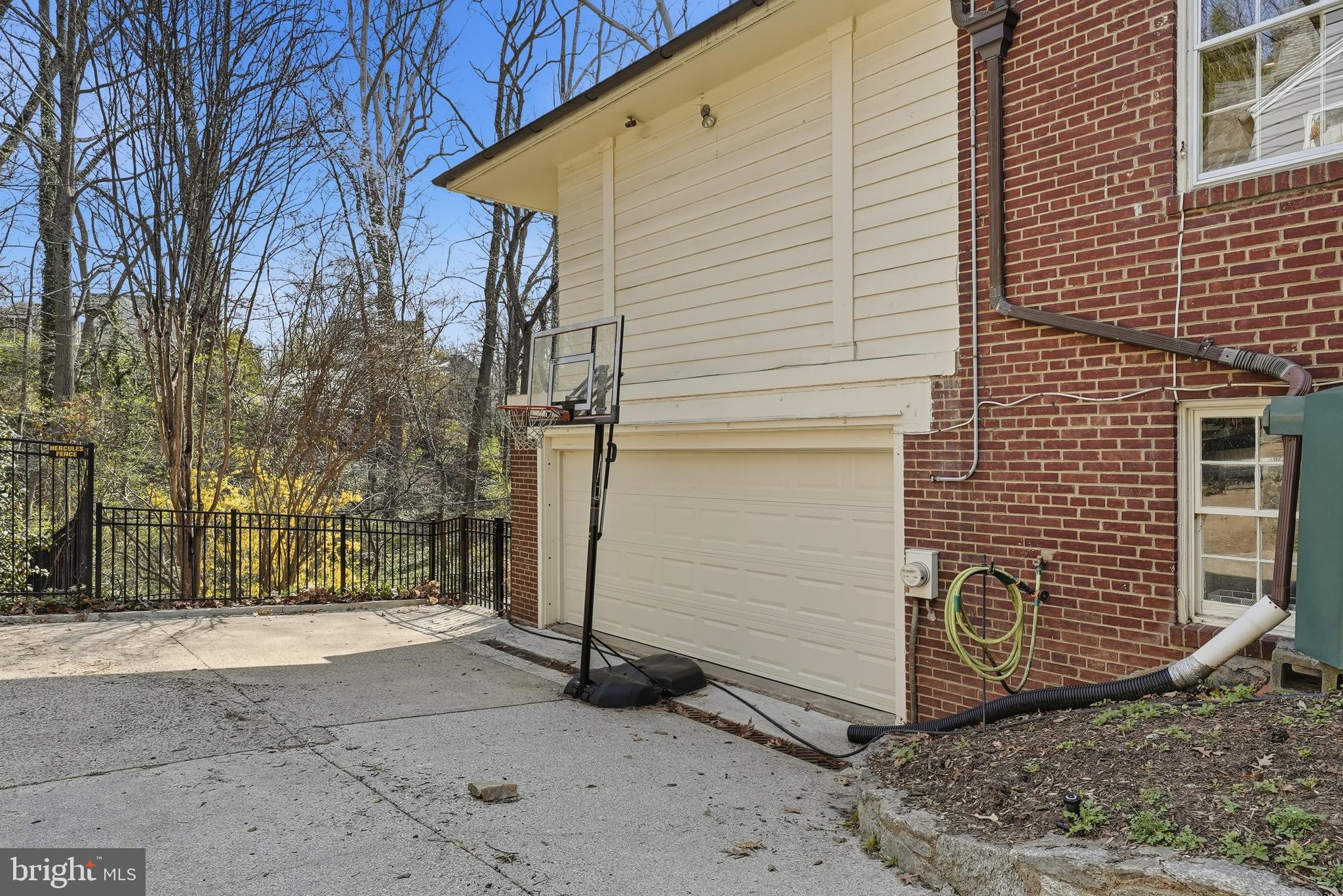 4938 Quebec Street Northwest Washington, DC 20016 - Photo 49 of 51 a view of a house with a yard