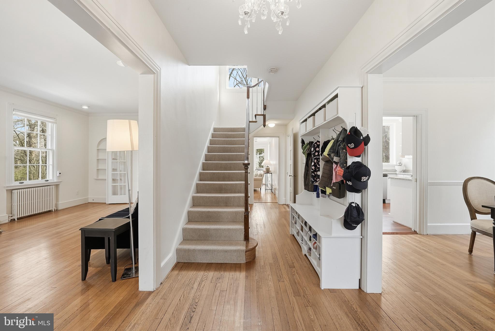 4938 Quebec Street Northwest Washington, DC 20016 - Photo 5 of 51 a view of entryway and hall with wooden floor