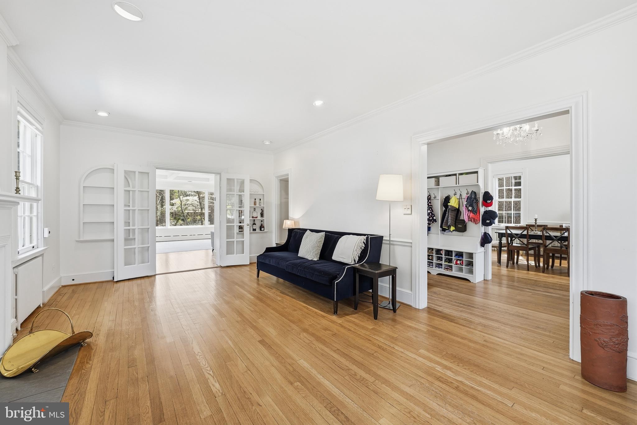 4938 Quebec Street Northwest Washington, DC 20016 - Photo 7 of 51 a living room with furniture and hard wood flooring