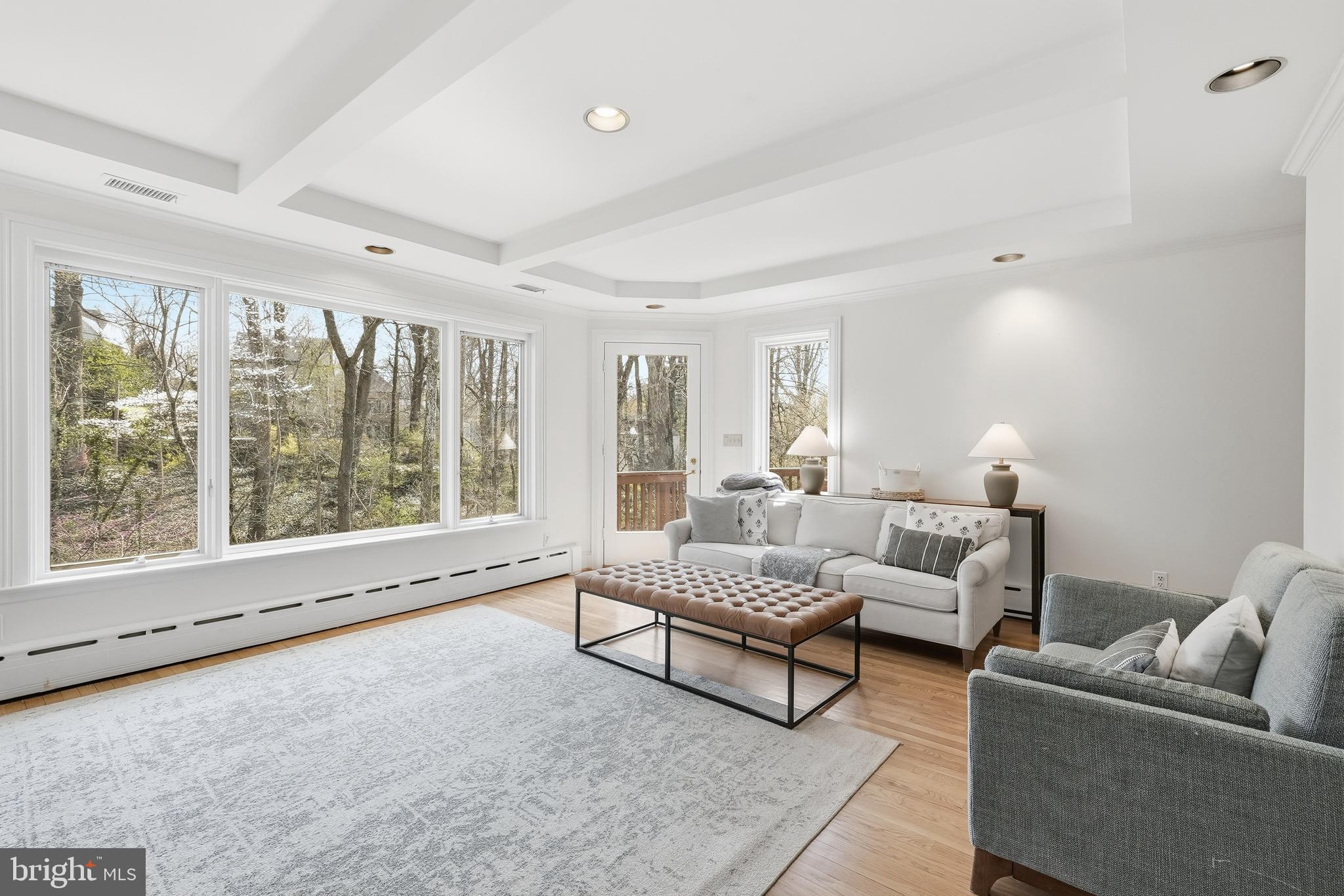 4938 Quebec Street Northwest Washington, DC 20016 - Photo 9 of 51 a living room with furniture and a large window