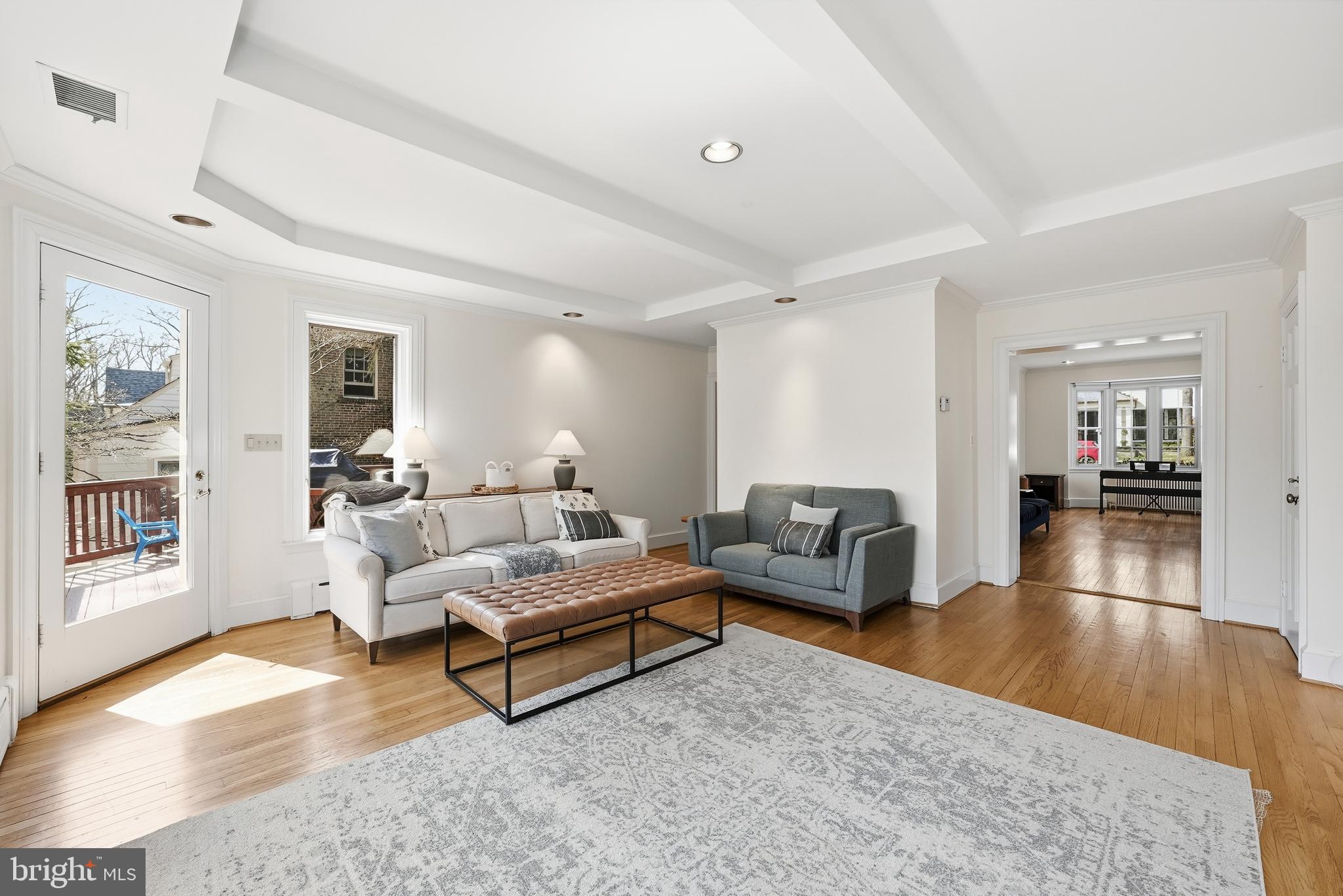 4938 Quebec Street Northwest Washington, DC 20016 - Photo 10 of 51 a living room with furniture and a wooden floor