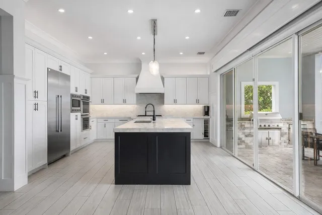 a bedroom with a bed and a table in it