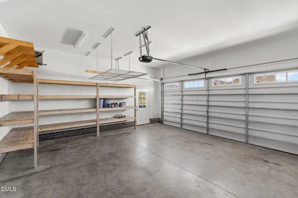 a view of a room with storage and utility room