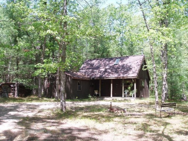 5525 9 Mile Bridge Road Manistee, MI 49660 - Photo 1 of 24 Primary Photo