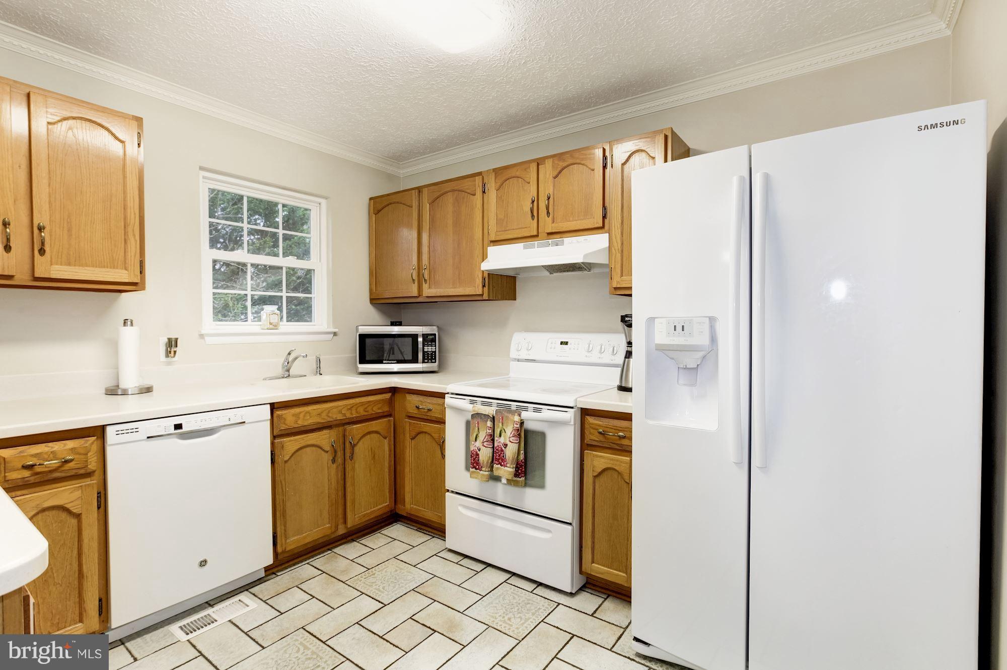 3453 Brookhaven Road Pasadena, MD 21122 - Photo 15 of 43 Kitchen with Tile Flooring