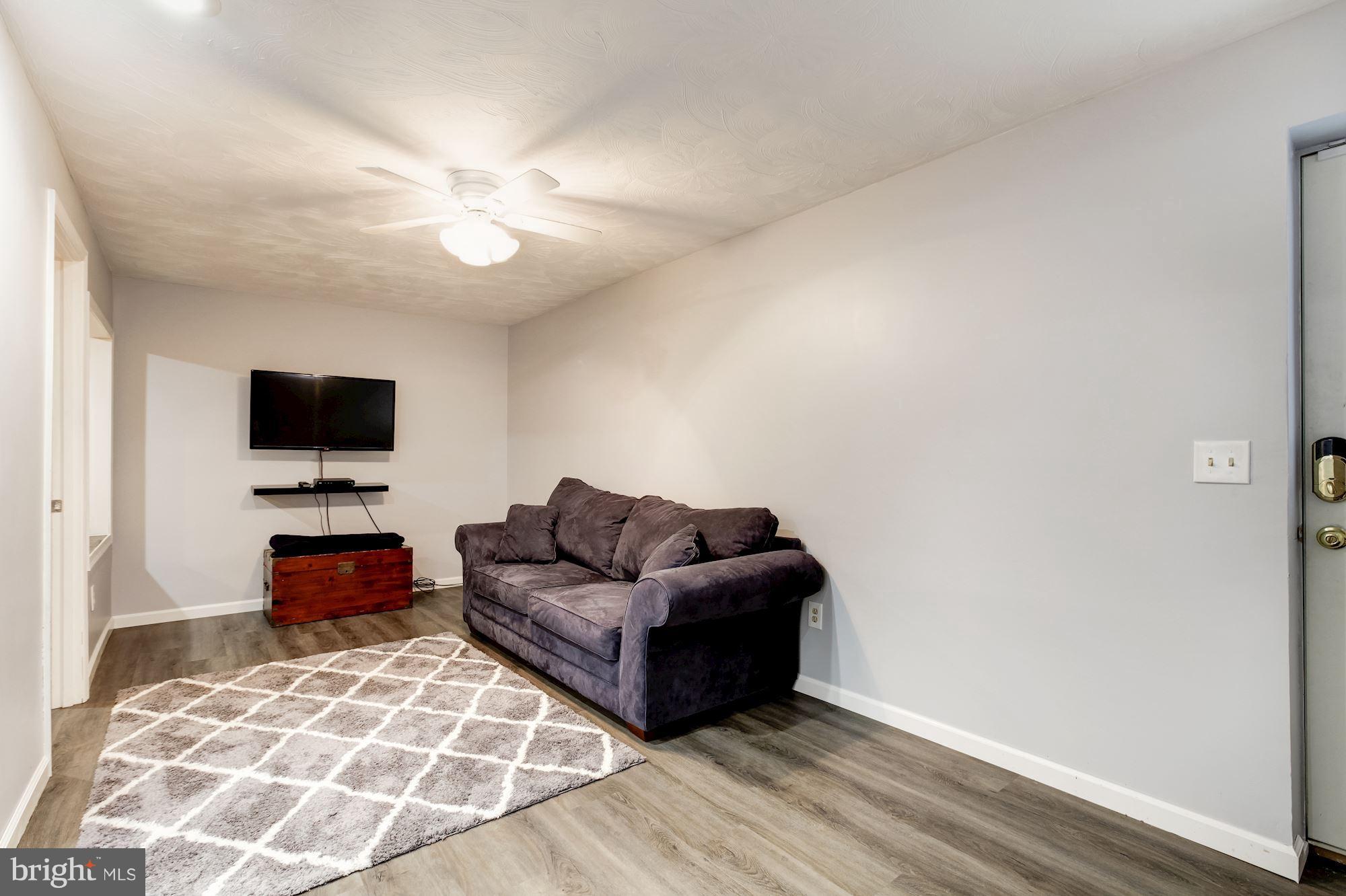 3453 Brookhaven Road Pasadena, MD 21122 - Photo 32 of 43 Lower Level Rec Room