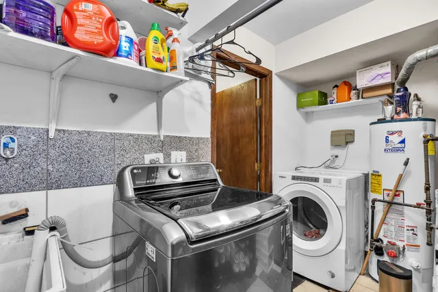 a view of house with deck outdoor seating and yard in the back