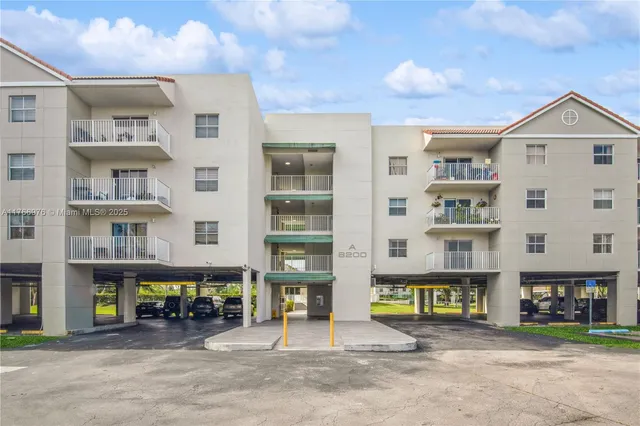 a view of livingroom with glass windows and cabinet