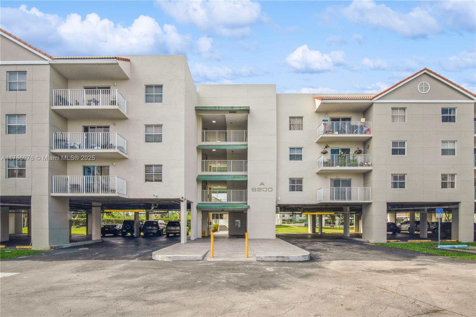 8200 Southwest 210th Street, Unit 111 Cutler Bay, FL 33189 - Photo 20 of 23 a view of livingroom with glass windows and cabinet