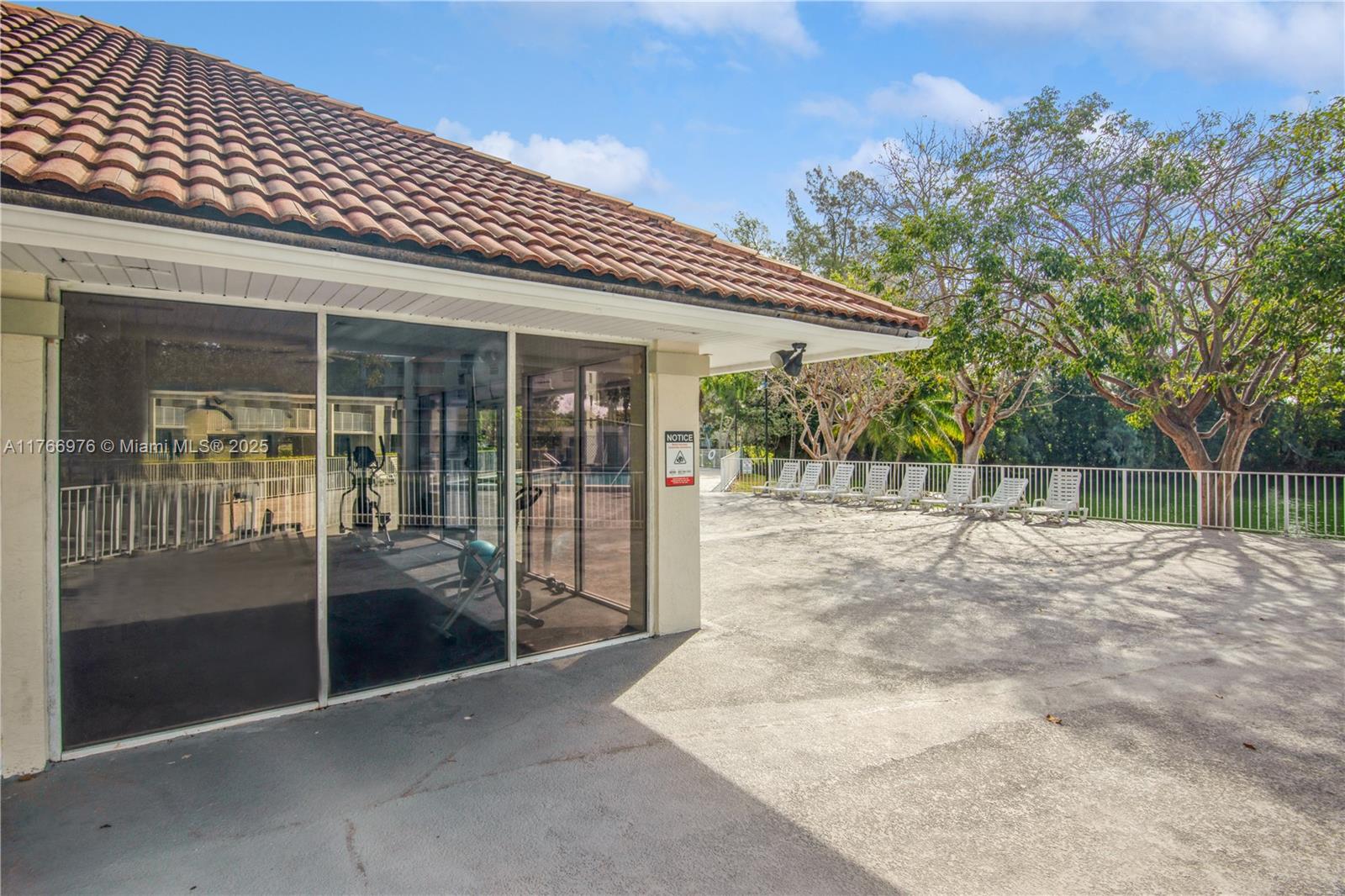 8200 Southwest 210th Street, Unit 111 Cutler Bay, FL 33189 - Photo 22 of 23 a view of a house with backyard