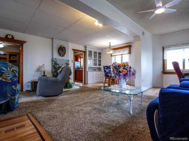 a white toilet sitting next to a shower