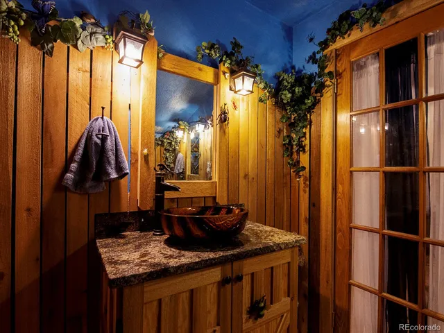 a bedroom with a bed and a walk in closet