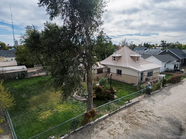 a view of a house with a garden