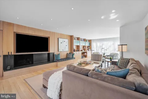 a view of a house with sitting area and furniture