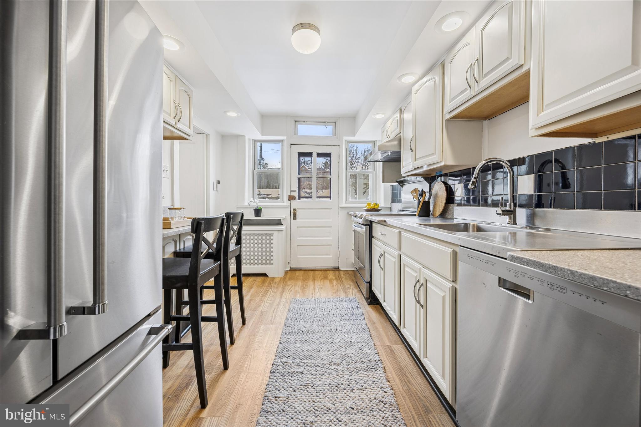 34 Hilltop Road Philadelphia, PA 19118 - Photo 15 of 43 Kitchen with access to outside patio
