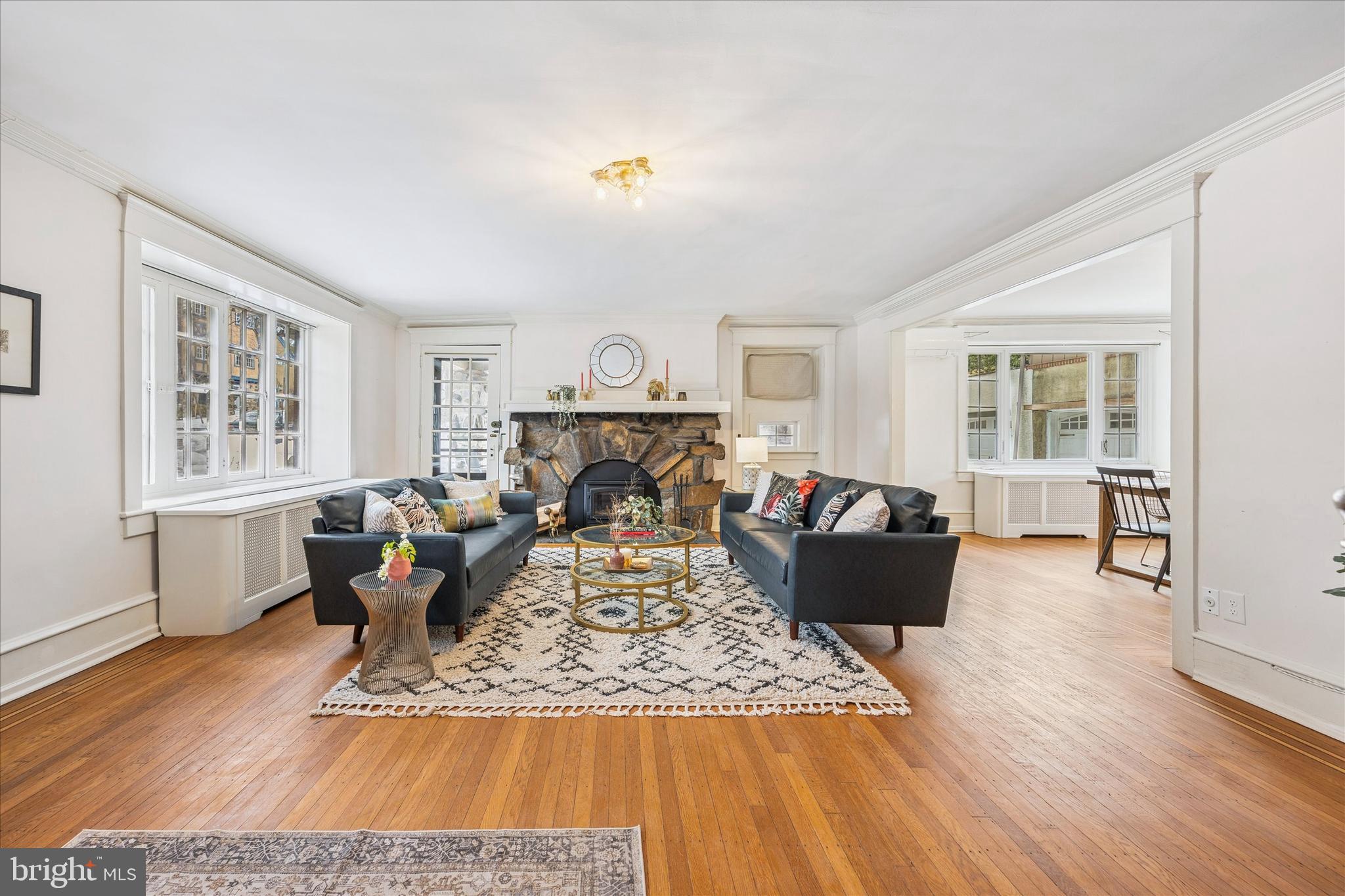 34 Hilltop Road Philadelphia, PA 19118 - Photo 3 of 43 Living room, left door opens up to side patio