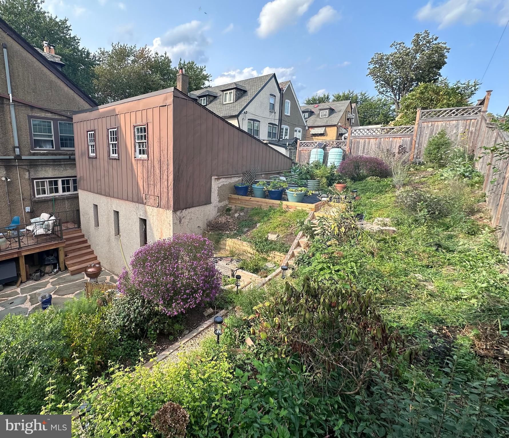 34 Hilltop Road Philadelphia, PA 19118 - Photo 39 of 43 View from tiered garden of garage with loft space