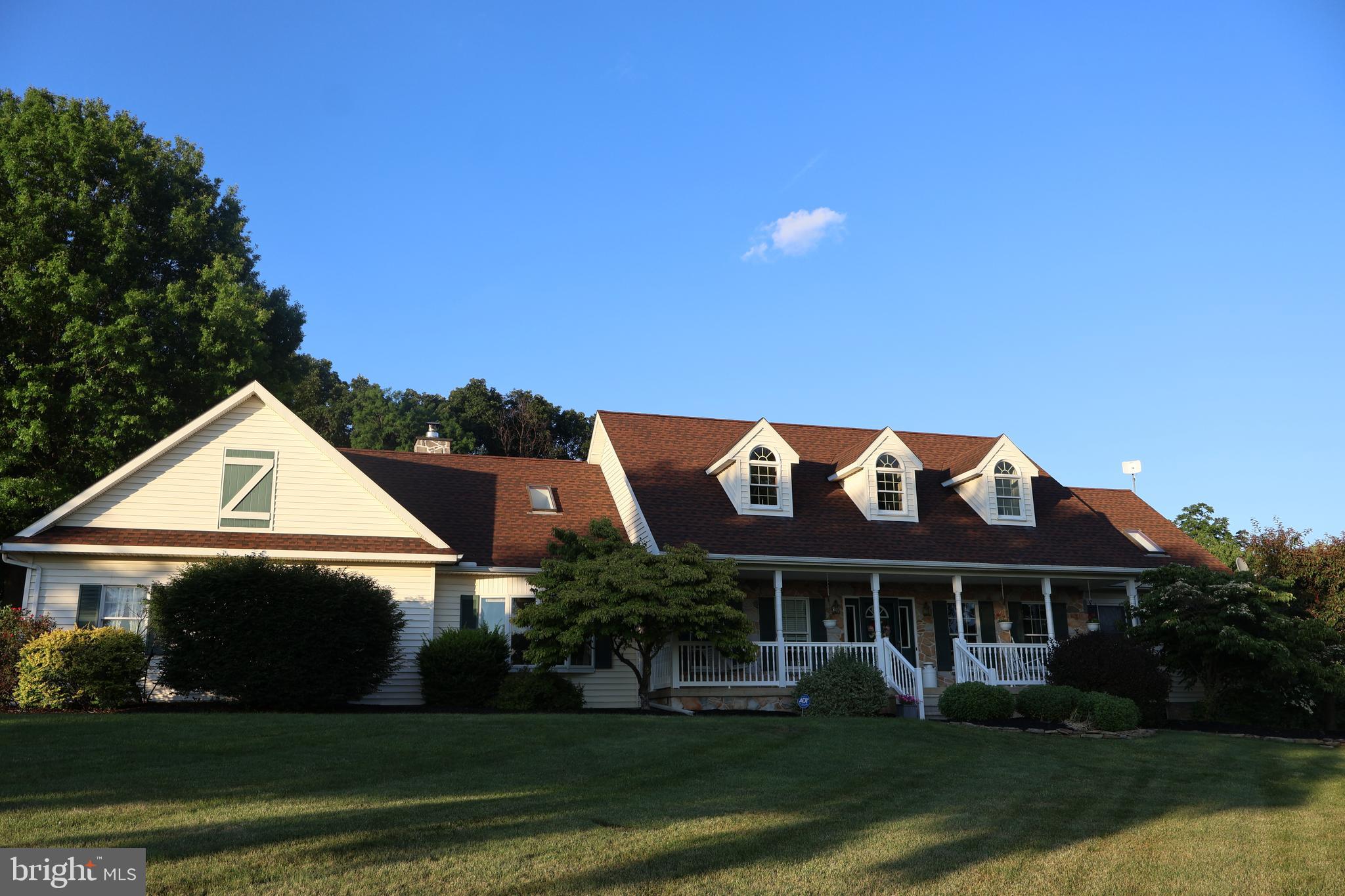 509 Buchland Road Narvon, PA 17555 - Photo 5 of 94 a front view of a house with a yard