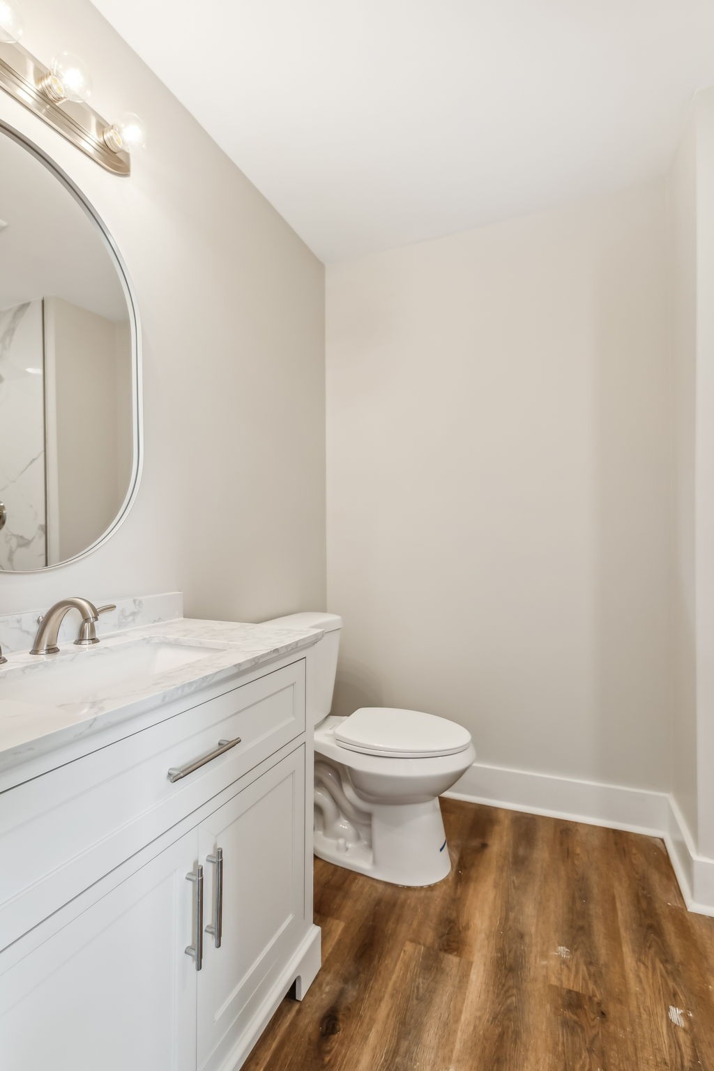 2801 Hunters Point Pike Lebanon, TN 37087 - Photo 13 of 23 a bathroom with a toilet a sink and mirror