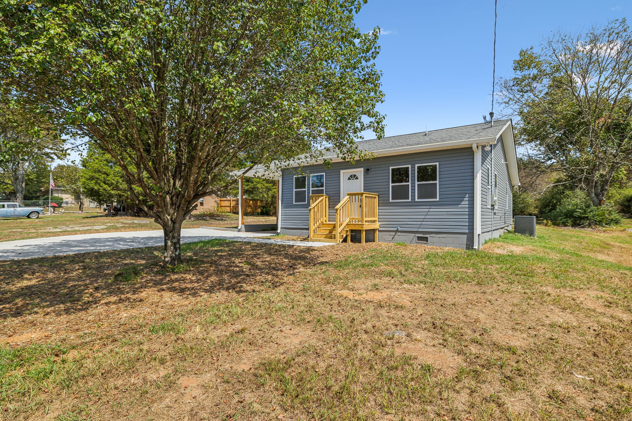 2801 Hunters Point Pike Lebanon, TN 37087 - Photo 2 of 23 a view of a house with backyard and trees