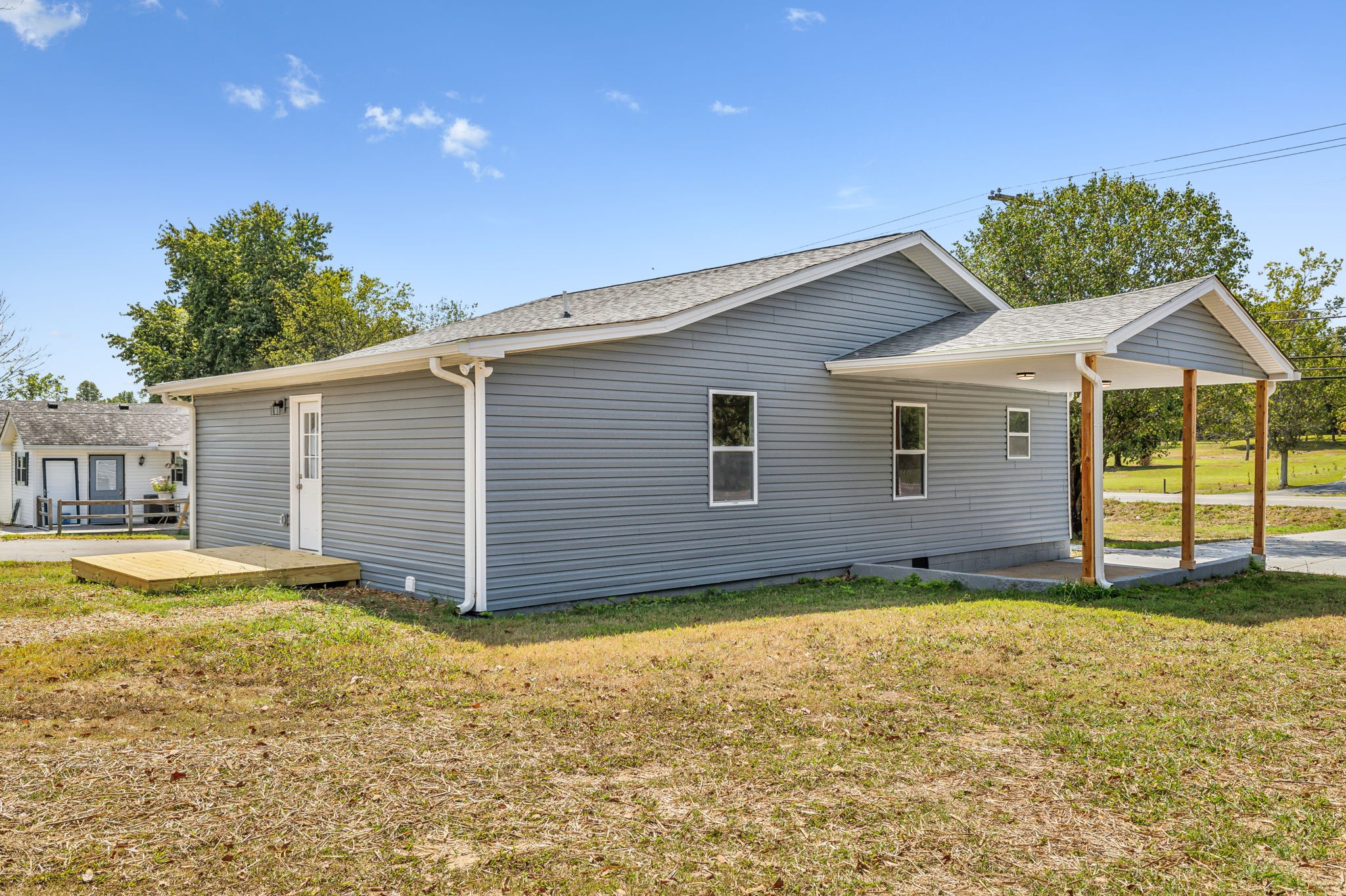 2801 Hunters Point Pike Lebanon, TN 37087 - Photo 21 of 23 a view of a house with a yard and garage