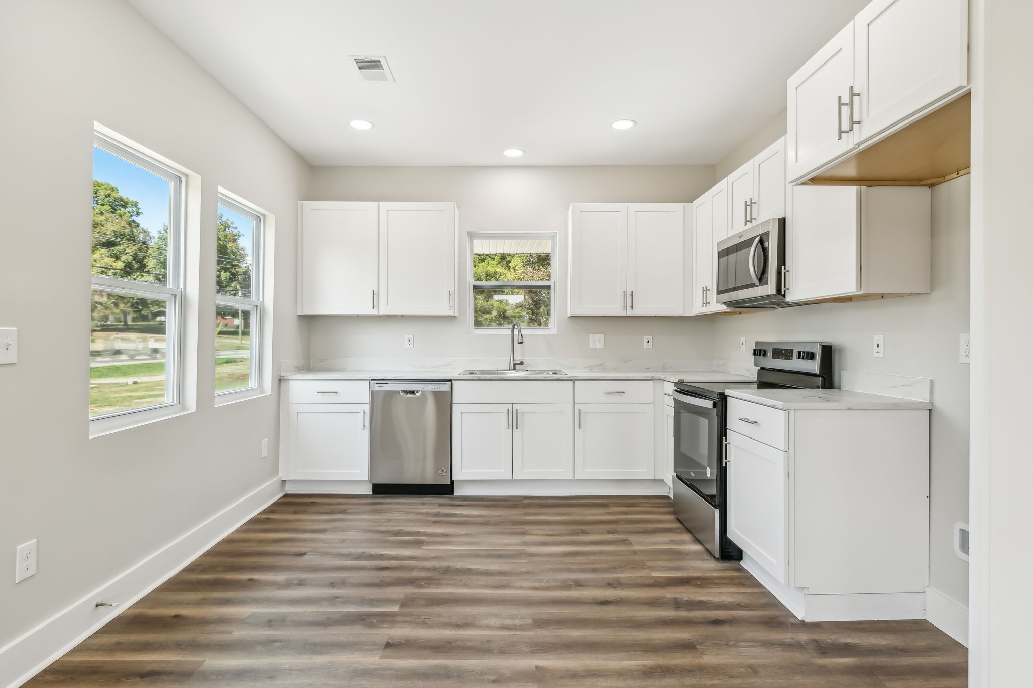 2801 Hunters Point Pike Lebanon, TN 37087 - Photo 4 of 23 a kitchen with a white cabinets and window