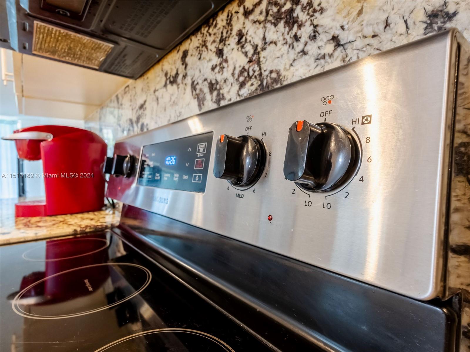 8331 Sands Point Boulevard, Unit C108 Tamarac, FL 33321 - Photo 15 of 46 a close view of car and mirror