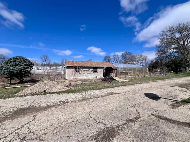 a view of a yard with an outdoor space