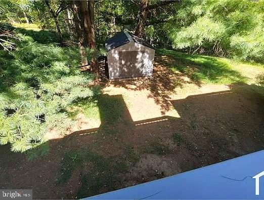 10936 Baskerville Road Reisterstown, MD 21136 - Photo 13 of 15 Serene backyard retreat with shed.